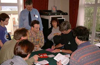 Ben Thompson, Roger Penny (standing), Rachel Frenkel (kibitzing), Paul Marston